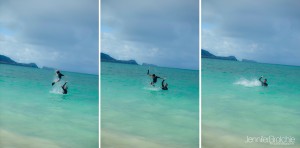 Family having fun playing in Lanikai Beach, Oahu, Hawaii.